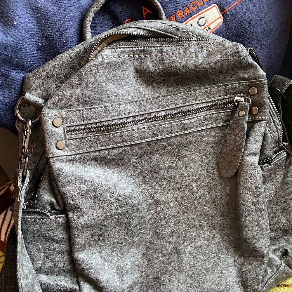 Grey Backpack with over shoulder strap